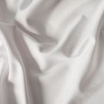 Wodoodporny materiał na zasłony lub obrusy, kolor biały, szerokość 164 cm - sprzedawany na metry