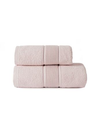 Pudrowo różowy ręcznik bawełniany Naomi z elegancką bordiurą