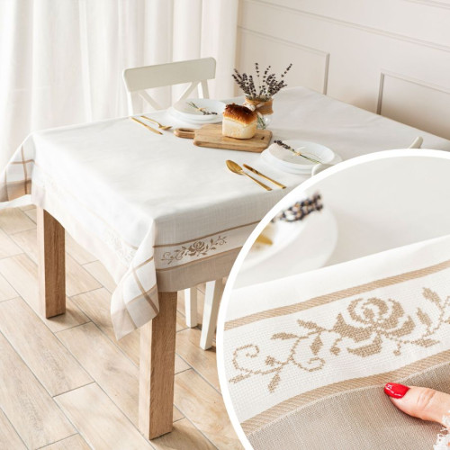 Obrus ASTRA biało-beżowy z haftem kwiatowym na stole w jadalni ze zbiżeniem haftu – elegancka dekoracja stołu