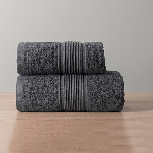 Granatowy ręcznik bawełniany Naomi z odcieniami szarości i elegancką bordiurą