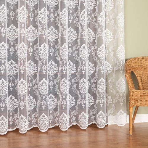 Długa firanka żakardowa z liściasto-ornamentowym wzorem, kolor biały, wysokość 250 cm - sprzedawana na metry