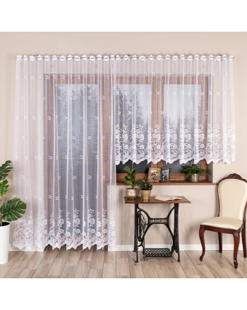 Długa gotowa, biała firanka żakardowa z fabrycznymi otworami na drążek karnisza, wykończona delikatną falą, rozmiar 300x250 cm Sara