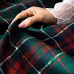 Wodoodporny materiał na zasłony lub obrusy z nadrukiem szkockiej kraty w odcieniu zielonym, szerokość 160 cm, Szkoti - sprzedawany na metry